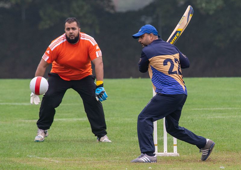 Shazad batting watched by Tokeer.jpg